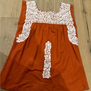 Noel burnt orange top with with white Embroidered Flowers - small texas football